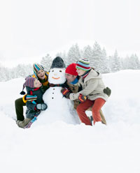Family and snowman